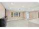 Bright living room showcasing modern windows, recessed lighting, and a seamless transition to the open floor plan at 3136 Webber St, Sarasota, FL 34239