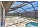Covered pool area with spa and lots of room for outdoor furniture at 3136 Webber St, Sarasota, FL 34239