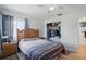 Cozy bedroom with natural light, a ceiling fan, and a double bed with a striped blanket at 3260 Pinetree St, Port Charlotte, FL 33952