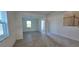 Open living space with neutral paint, large windows, and ceramic tile flooring at 3531 Night Star Ter, Parrish, FL 34219