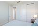 Bright bedroom with closet and ensuite bathroom at 3684 Fescue Ln, Sarasota, FL 34232