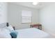 Cozy bedroom with natural light and comfortable bed at 3684 Fescue Ln, Sarasota, FL 34232