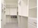 Spacious walk-in closet with ample shelving and hanging space, offering lots of storage at 3684 Fescue Ln, Sarasota, FL 34232