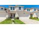 Charming townhome with a two-car garage, well-kept lawn, and inviting curb appeal at 3684 Fescue Ln, Sarasota, FL 34232