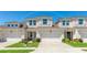 Charming townhome with a well-manicured lawn and a two-car garage for convenient parking and curb appeal at 3684 Fescue Ln, Sarasota, FL 34232