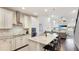 Modern kitchen with granite countertops, stainless steel appliances, and breakfast bar at 3684 Fescue Ln, Sarasota, FL 34232