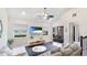 Cozy living room featuring a vaulted ceiling, modern furniture, and an inviting atmosphere at 3684 Fescue Ln, Sarasota, FL 34232