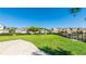 Lush green common area with seating, providing a relaxing space within the community at 3684 Fescue Ln, Sarasota, FL 34232