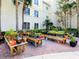 Landscaped garden featuring an array of plants and flowers, creating a lush and vibrant outdoor space at 3730 Cadbury Cir # 631, Venice, FL 34293