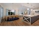 Bright, open-concept kitchen with a large island, dining area, and views to the living room at 408 Magnolia Ave, Anna Maria, FL 34216