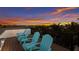 Rooftop deck with seating, perfect for enjoying stunning sunset views over the neighborhood at 408 Magnolia Ave, Anna Maria, FL 34216