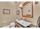 Powder room featuring a unique sink design and stylish decor at 416 Casey Key Rd, Nokomis, FL 34275