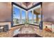 Kitchen sink nestled under windows with a picturesque water view at 416 Casey Key Rd, Nokomis, FL 34275