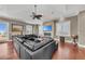 Open living area with a fireplace, hardwood floors, and lots of natural light at 416 Casey Key Rd, Nokomis, FL 34275