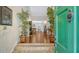 View from the front door of a foyer with hardwood floors and access to the dining and living room at 4326 Brackenwood Ct, Sarasota, FL 34232