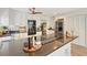 Kitchen featuring a large center island with modern appliances, ample cabinetry, and stainless steel refrigerator at 4326 Brackenwood Ct, Sarasota, FL 34232