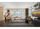 Open kitchen layout with bar-style island, modern appliances, and adjacent dining area at 4326 Brackenwood Ct, Sarasota, FL 34232