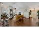 Well-lit living room with a fireplace, high ceilings, and views at 4326 Brackenwood Ct, Sarasota, FL 34232