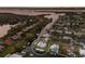Aerial view of waterfront home showcasing its location among canals, and lush surroundings at 4517 Pinfish Ln, Palmetto, FL 34221