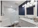Modern bathroom featuring a glass-enclosed shower, sleek vanity, and contemporary fixtures at 4517 Pinfish Ln, Palmetto, FL 34221