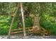 Picturesque wooden boardwalk winding through a lush, green natural area with dense vegetation at 4517 Pinfish Ln, Palmetto, FL 34221