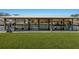 Well-maintained boat dock featuring sturdy support beams, ample space for boats, and easy water access at 4517 Pinfish Ln, Palmetto, FL 34221