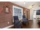 Inviting entryway with nautical décor, including unique textured wallpaper and seating area at 4517 Pinfish Ln, Palmetto, FL 34221