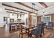 Bright and airy open concept kitchen and dining room with island and modern fixtures at 4517 Pinfish Ln, Palmetto, FL 34221