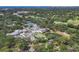 Aerial view of the community showcasing amenities, landscaping, and recreational facilities at 4947 Greencroft Rd # 175, Sarasota, FL 34235