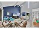 Living room boasts high ceilings, with plenty of natural light and comfortable seating at 4947 Greencroft Rd # 175, Sarasota, FL 34235