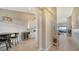 Inviting entryway features tile floors and leads to the living and dining areas at 5424 Cicerone St # 204, Sarasota, FL 34238