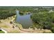 Community park features a walking path, small picnic pavilion and is surrounded by mature landscaping at 5504 Beneva Woods Circle, Sarasota, FL 34233