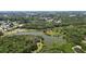 High angle image highlighting established homesites and tranquil ponds amid the surrounding natural beauty at 5504 Beneva Woods Circle, Sarasota, FL 34233