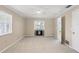 This vacant bedroom features carpeted floors, neutral walls, white trim, plantation shutters, and plenty of light at 5504 Beneva Woods Circle, Sarasota, FL 34233