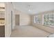 Spacious bonus room with natural light and neutral walls, featuring chair railing at 5504 Beneva Woods Circle, Sarasota, FL 34233
