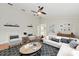Cozy living room featuring stylish decor, hardwood floors, and comfortable seating at 5504 Beneva Woods Circle, Sarasota, FL 34233