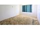 Bedroom showcasing a large window providing natural light at 5901 Garden Ln # H23, Bradenton, FL 34207