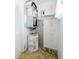 Utility room with hot water tank and furnace at 5901 Garden Ln # H23, Bradenton, FL 34207