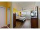 Bright bedroom with waterfront view, wood floors, ceiling fan, and ample closet space at 615 Dream Island Pl # 303, Longboat Key, FL 34228