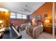 Bedroom with twin beds, fan and natural light at 615 Dream Island Pl # 303, Longboat Key, FL 34228