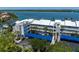 Waterfront condo complex boasts covered parking, balconies, and stunning water views at 615 Dream Island Pl # 303, Longboat Key, FL 34228