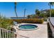 Outdoor hot tub surrounded by lush tropical landscape near the ocean at 615 Dream Island Pl # 303, Longboat Key, FL 34228