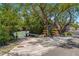 Community kayak storage with a dock and serene waterway access at 615 Dream Island Pl # 303, Longboat Key, FL 34228