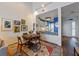 Open-concept living space connects the dining area, living room, and kitchen at 615 Dream Island Pl # 303, Longboat Key, FL 34228