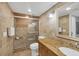 Bathroom showcasing a glass-enclosed shower, toilet, and vanity with a granite countertop at 6236 Midnight Pass Rd # 300, Sarasota, FL 34242