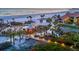 Picturesque beach access with a gazebo and boardwalk leading to the beach and ocean at 6236 Midnight Pass Rd # 300, Sarasota, FL 34242