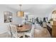 Bright dining room showcasing open layout and ample natural light at 6236 Midnight Pass Rd # 300, Sarasota, FL 34242