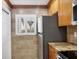 Kitchen featuring stainless steel appliances and view from the window at 6236 Midnight Pass Rd # 300, Sarasota, FL 34242