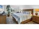 Serene main bedroom with coastal decor, plantation shutters and calming colors at 6236 Midnight Pass Rd # 300, Sarasota, FL 34242