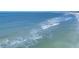 Scenic ocean view showcasing the crystal-clear water with gentle waves, perfect for a tranquil and relaxing experience at 6236 Midnight Pass Rd # 300, Sarasota, FL 34242